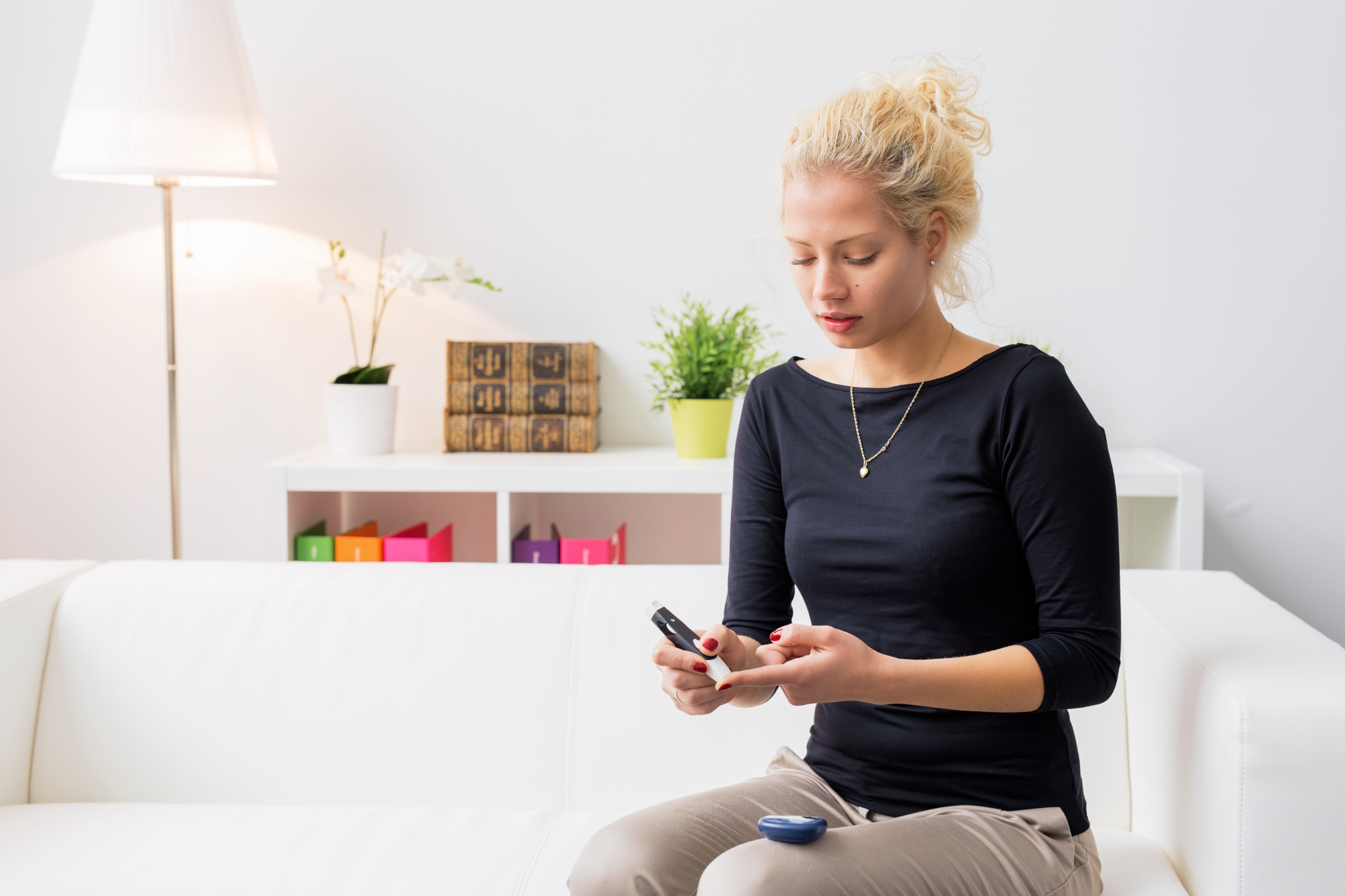 Woman checking insulin levels