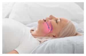 Patient sleeping peacefully after treatment for sleep apnea